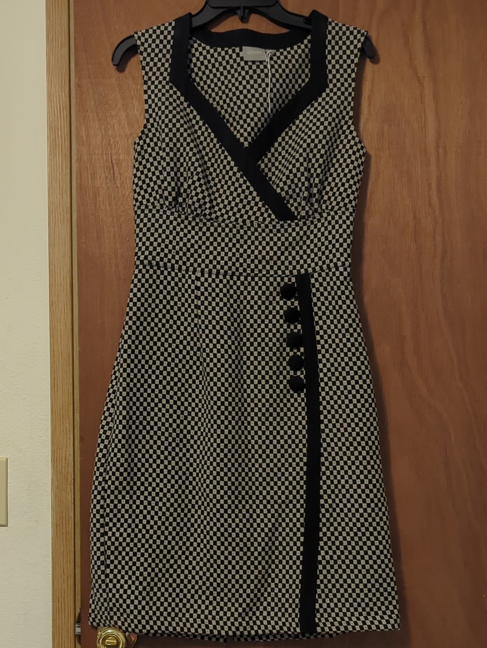 Sleeveless Black and Cream Checkered Wrap-Style Mini Dress